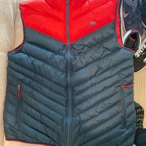 Nike zip up vest.